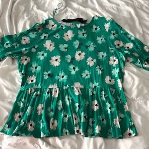 Gorgeous grew with floral top and now accent